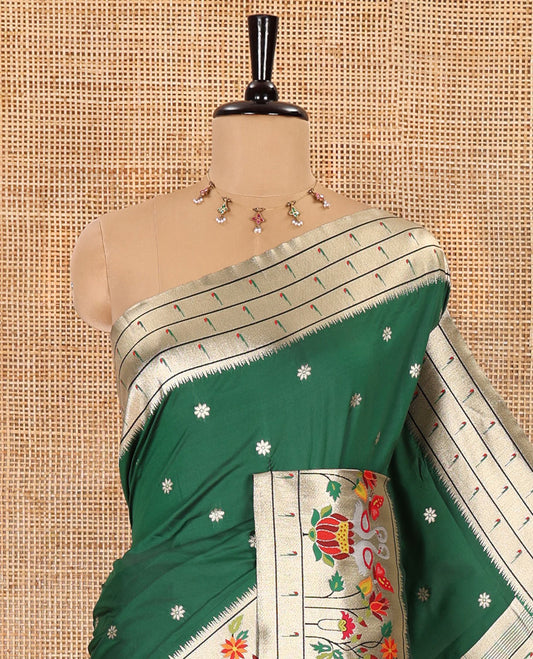 Bottle green floral buttas art silk paithani saree, contrast floral, bird, and muniya border, pallu of floral and bird designs and a matching blouse