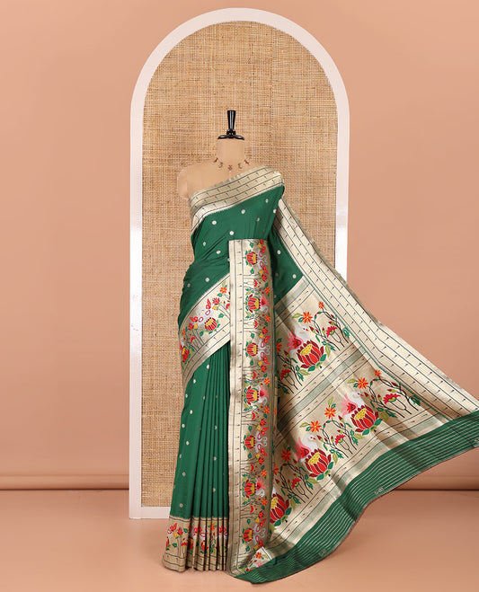 Bottle green floral buttas art silk paithani saree, contrast floral, bird, and muniya border, pallu of floral and bird designs and a matching blouse