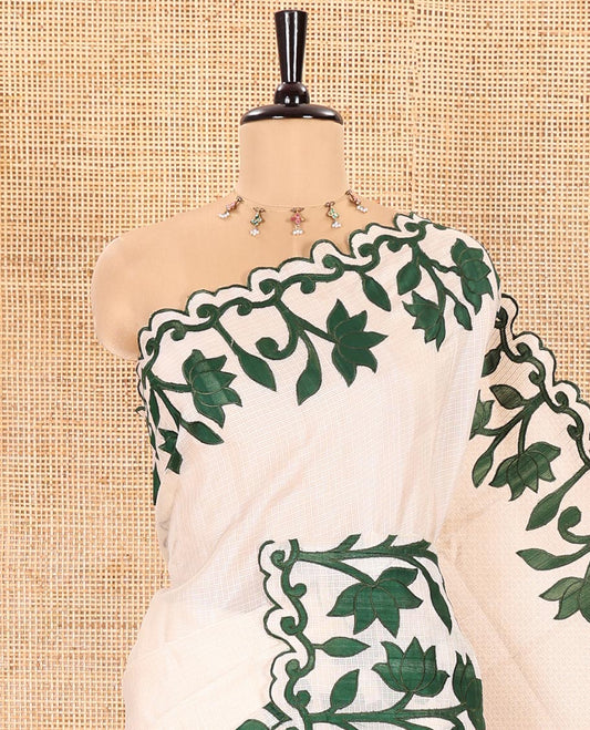 Cream and Green Plain Fancy Kota Silk Saree Highlighted with Lotus Floral Applique Embroidered Scallop Border, Lotus Motifs Applique Embroidered Pallu, and a Contrast Plain Blouse