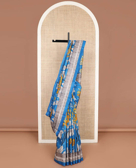 Light blue floral printed silk saree with contrast floral border & floral design pallu