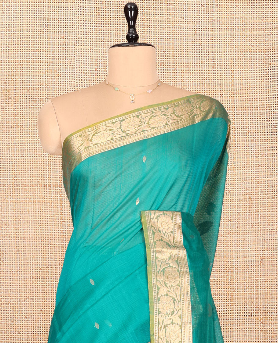 Green Silk Cotton Saree, Detailed with Buttas, Complemented by Contrast Floral Creeper Border, Pallu of Floral Designs, and Contrast Blouse