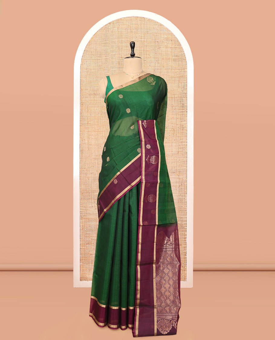 Green Cotton Saree, Enriched with Floral Buttas, a Contrast One-Side Big Floral Zari Butta Border, a Jaal Pallu, and a Contrast Blouse