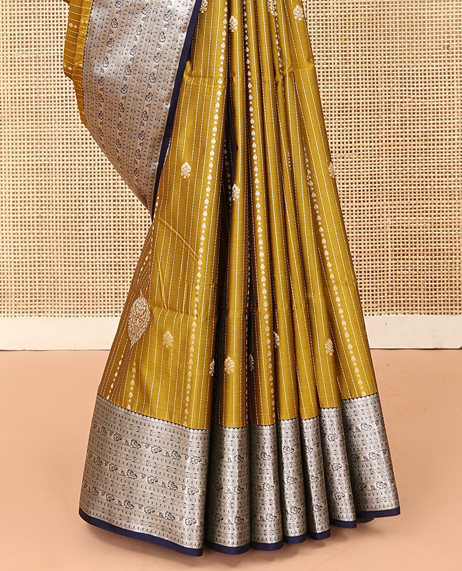 Yellow dotted stripes, and buttas soft silk saree, contrast traditional zari border, and scallop design pallu