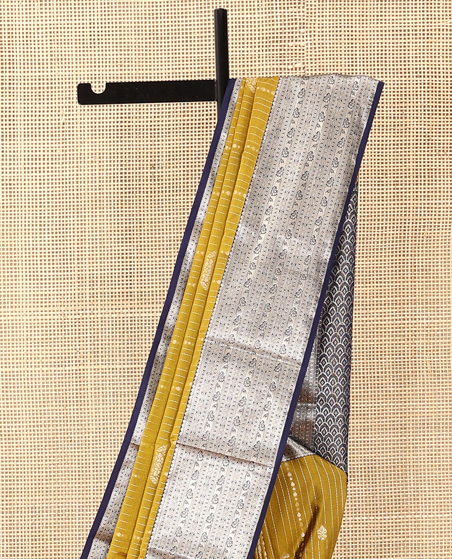 Yellow dotted stripes, and buttas soft silk saree, contrast traditional zari border, and scallop design pallu
