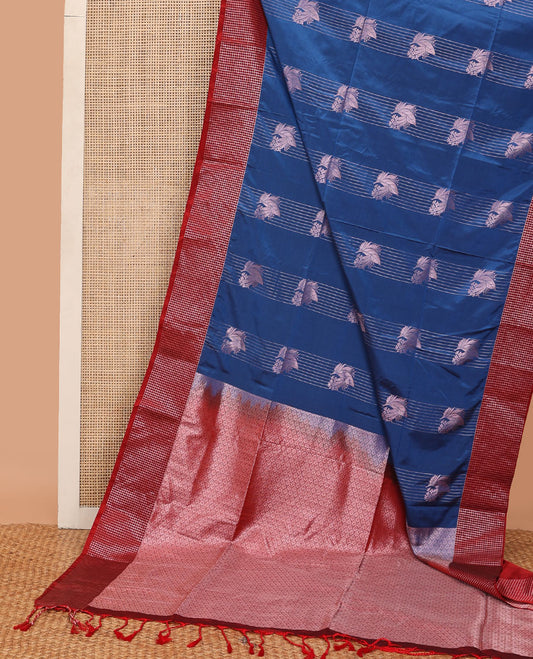 Blue semi-soft silk saree with zari stripes & leaf design, contrast zari checked border & ogee patterned pallu