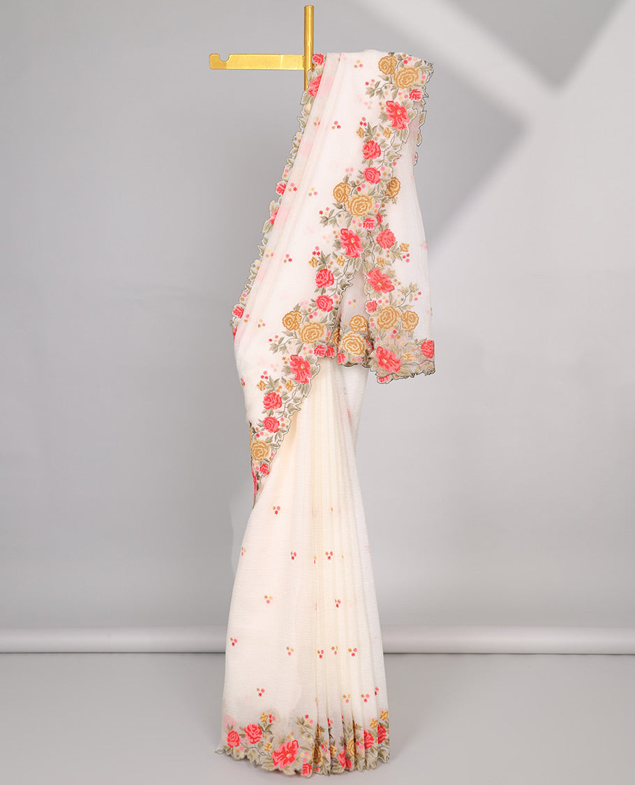 Yellow crushed tissue saree with scallop floral border & motif embroidery pallu