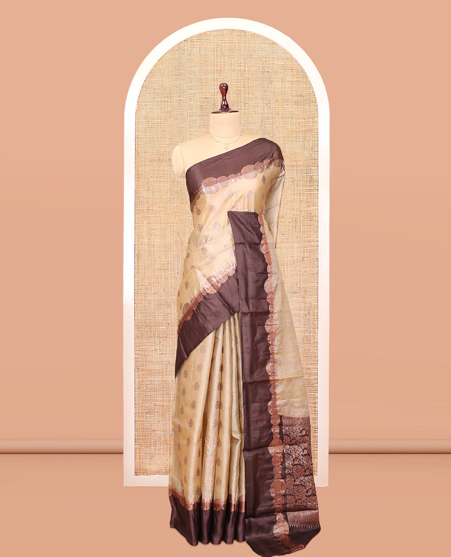 Sandal Tussar Silk Saree Features Buttas, Complemented by a Contrast Geometric Zari Border, Intricately Designed Pallu, and a Contrast Blouse