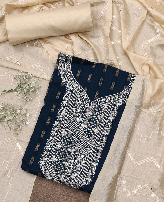 Blue material chudidar set, buttas with neck embroidered top, contrast plain bottom, and thread and sequins embroidered dupatta