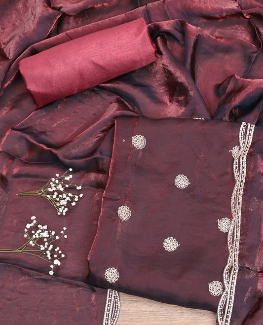 Maroon Material Churidar Set, Ornamented with Floral Embroidered Motif on Its Top, a Matching Bottom, and Scallop Embroidered Border Dupatta