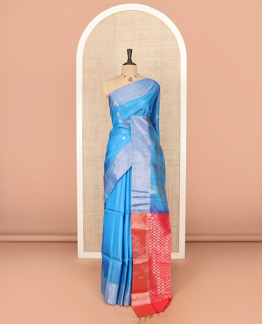 Blue Semi Uppada Saree Subtly Sparkled with Zari Buttas, Complemented by a Bavanji Border, Contrasting Pallu of Intricate Zari Designs, and Paired with a Contrast Blouse
