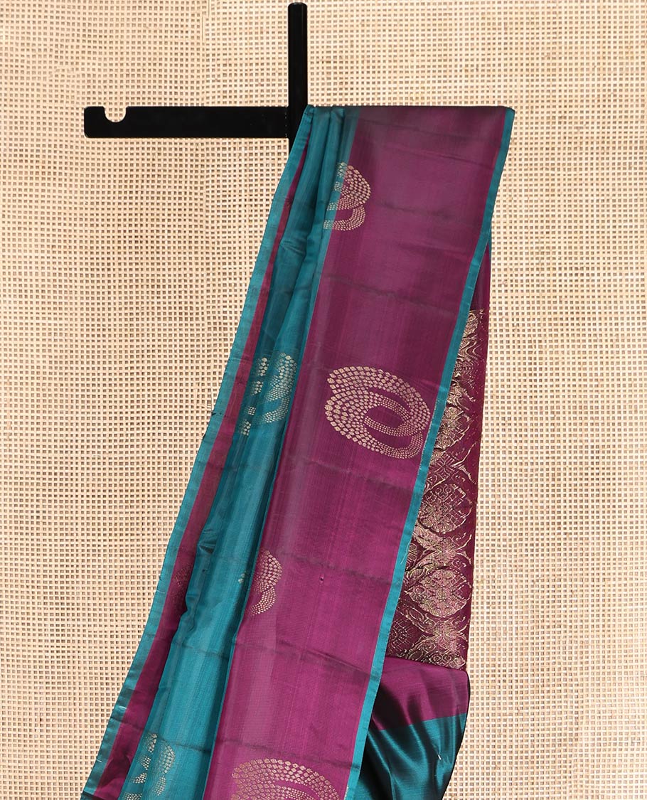 Blue Uppada Silk Saree, Styled with Zari Buttas, a Contrast Zari Buttas Border, Intricate Pallu, and a Contrast Blouse