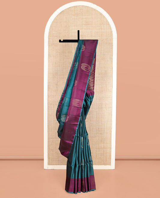 Blue Uppada Silk Saree, Styled with Zari Buttas, a Contrast Zari Buttas Border, Intricate Pallu, and a Contrast Blouse