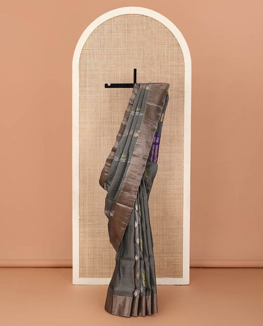 Grey zari buttas Uppada saree, bavanji border, and contrast jaal design pallu