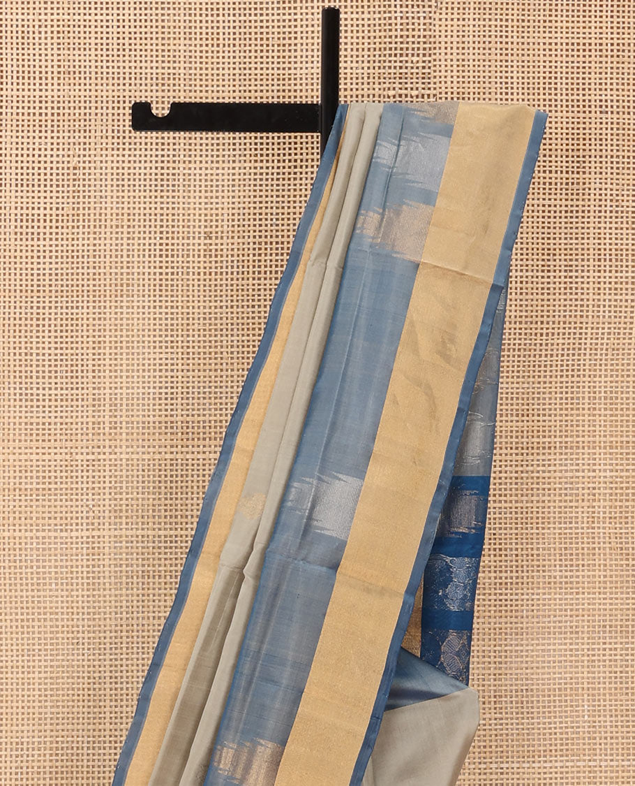 Grey Uppada Silk Saree Featuring Zari Buttas, Contrast Sparsely Woven Temple Border, Pallu Decked Up with Floral-Geometric Designs, and Paired with a Contrast Blouse
