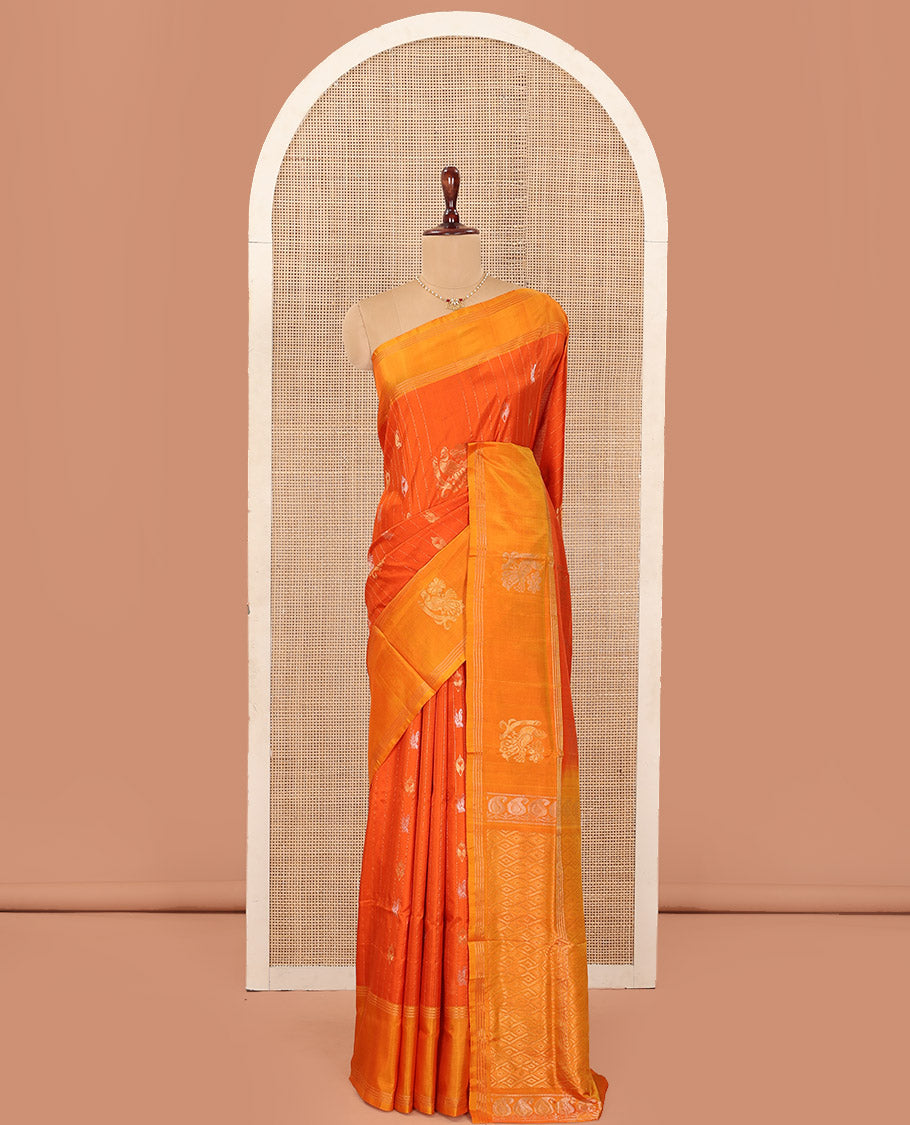 Orange Uppada Silk Saree Decked Up with Paisley and Peacock Buttas All Over Its Body, Complemented by Contrast Border of Peacock Designs, Sparsely Sparkled Pallu of Jaal Designs, and Paired with a Contrast Blouse