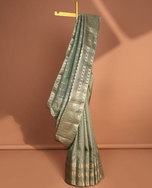 Green floral striped design vasundhara elite silk saree with self flora zari design border & pallu of ogee design