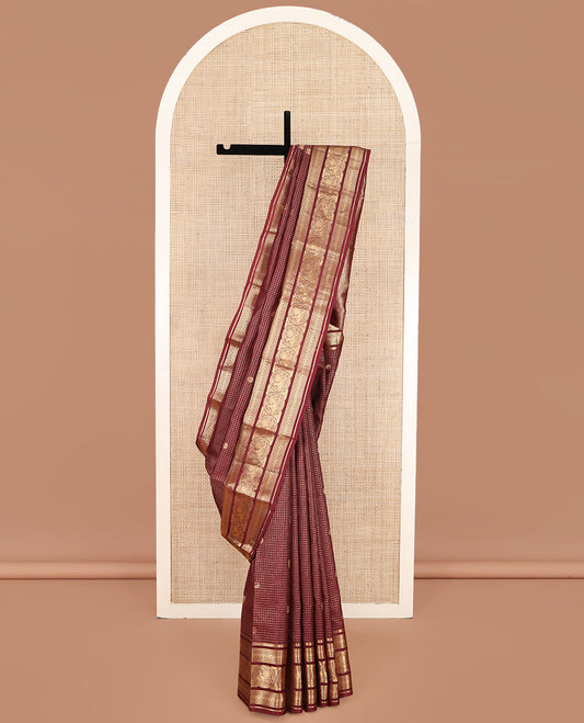 Maroon Vasundhara Lite Silk Mix Saree, Finely Crafted with Mayil-Chakram Butta Enclosed Checks on Its Body, Highlighted by a Zari Border of Ara Bogudi, Banaras, and Round Mayil Designs, Intricate Pallu, and Paired with a Matching Blouse