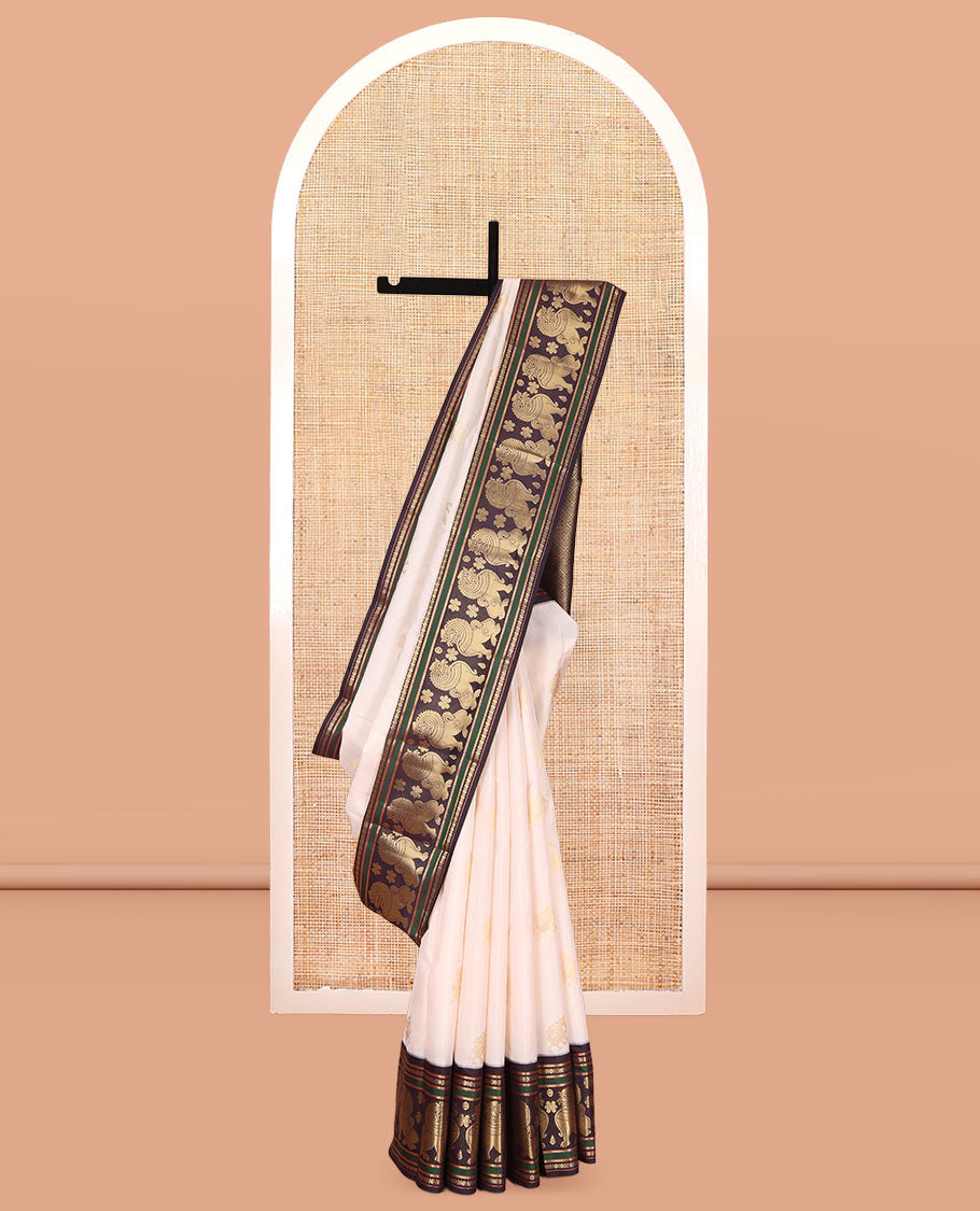 Cream Vasundhara Lite Silk Mix Saree, Woven with Yaali Buttas, a Contrast Singam Border, Grand Jaal Pallu, and a Contrast Blouse