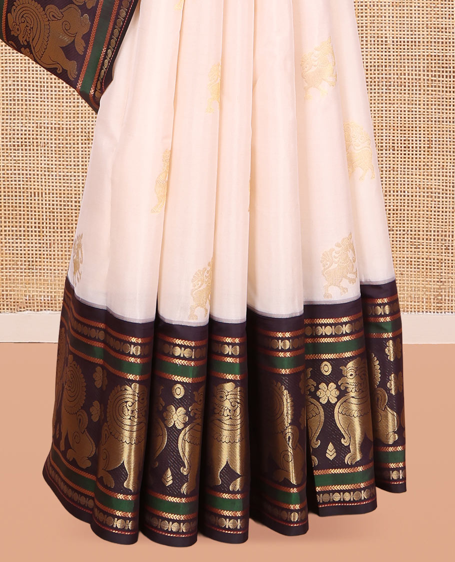 Cream Vasundhara Lite Silk Mix Saree, Woven with Yaali Buttas, a Contrast Singam Border, Grand Jaal Pallu, and a Contrast Blouse