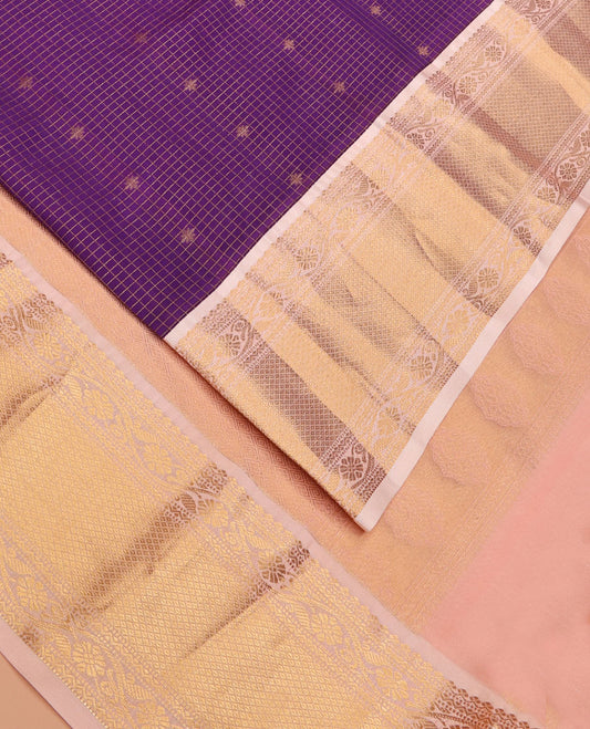 Purple Vasundhara Lite Silk Mix Saree Ornamented with Zari Buttas and Zari Checks, Complemented by a Contrast Border of Salangai, Muthu, Neli, Kodi Visiry, and Mayil Kann Designs, Beautified with Jaal Pallu, and Paired with a Contrast Blouse
