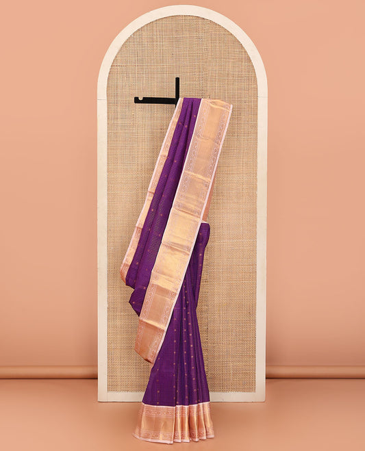 Purple Vasundhara Lite Silk Mix Saree Ornamented with Zari Buttas and Zari Checks, Complemented by a Contrast Border of Salangai, Muthu, Neli, Kodi Visiry, and Mayil Kann Designs, Beautified with Jaal Pallu, and Paired with a Contrast Blouse