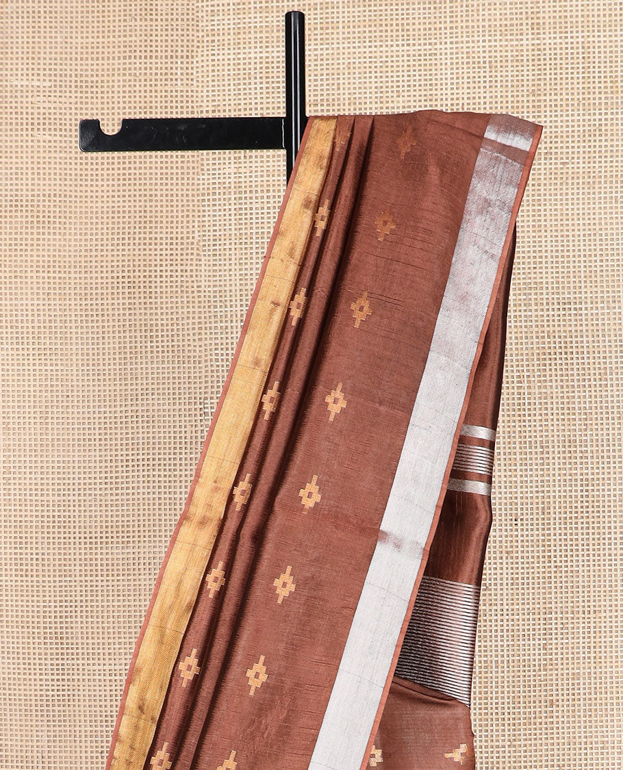 Brown diamond buttas banana pith saree, silver and gold bavanji border, and zari striped pallu
