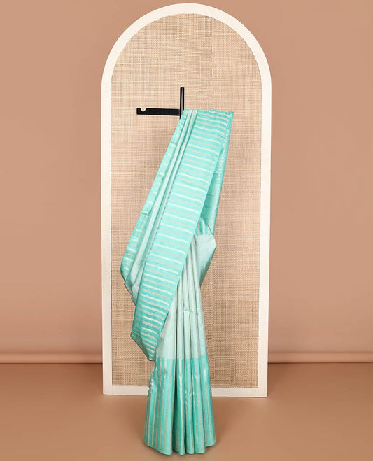 Sea green zari design silk saree with self striped border & floral design pallu