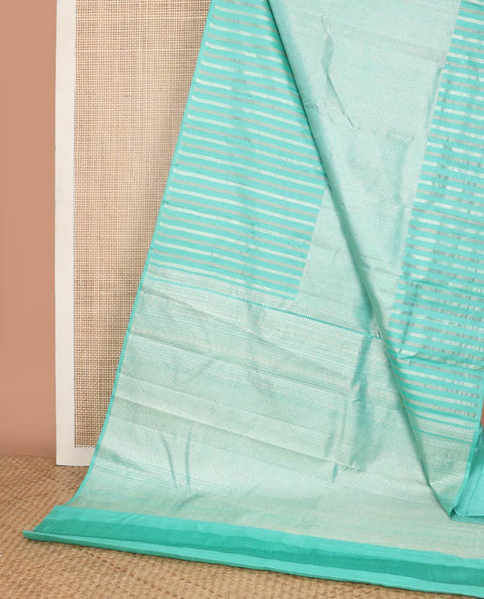 Sea green zari design silk saree with self striped border & floral design pallu
