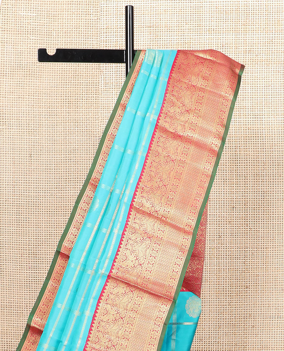 Blue butta enclosed checked silk saree, contrast border of rekku, muthu, manga, mayil, and kamalam designs, and jaal pallu
