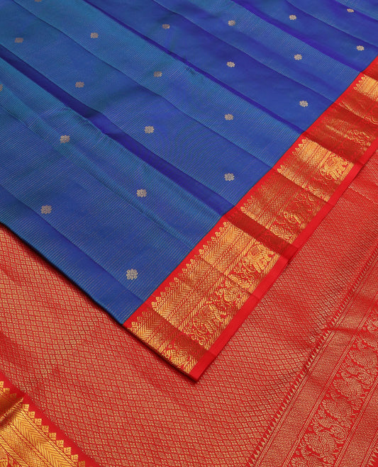 Blue zari buttas silk saree, contrast border of thilakam,banaras,kathir,jaal, yaanai & mayil & jaal pallu