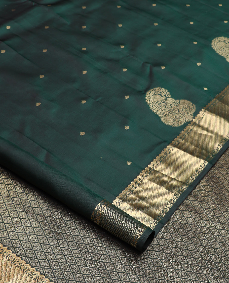 Green zari buttas silk saree, zari border of traditional designs, and jaal pallu