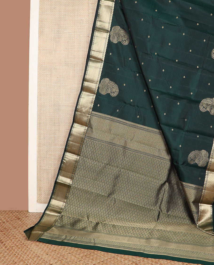 Green zari buttas silk saree, zari border of traditional designs, and jaal pallu