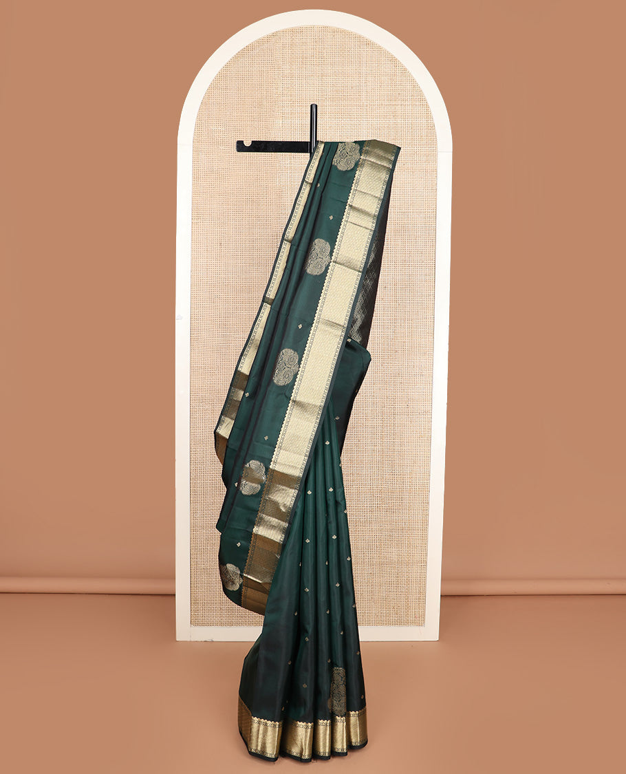 Green zari buttas silk saree, zari border of traditional designs, and jaal pallu