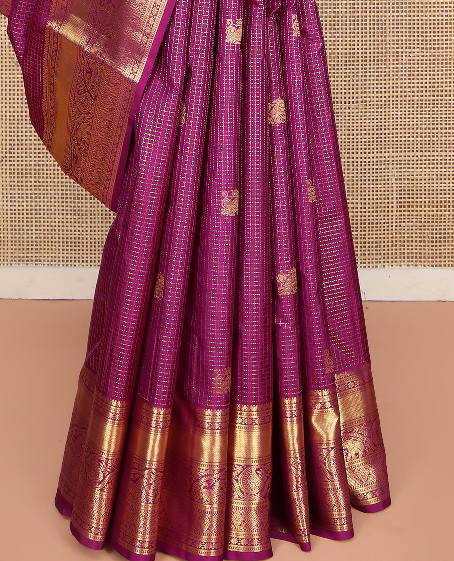 Purple Vasundhara Silk Saree, Dazzled with Zari Buttas and Zari Checks All Over Its Body, Highlighted by a Zari Border of Banaras, Muthu, Star Vanki, Manga, Kuthirai, and Yaanai Designs, Intricately Designed Pallu, and Paired with a Matching Blouse