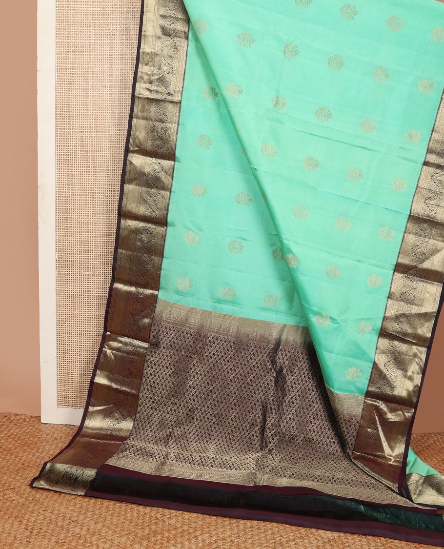 Turquoise floral buttas silk saree, contrast jaal pallu & border of rekku,manga,lavangam,kathir & zari stripes