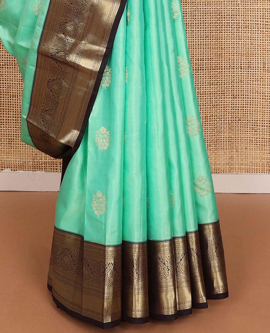 Turquoise floral buttas silk saree, contrast jaal pallu & border of rekku,manga,lavangam,kathir & zari stripes