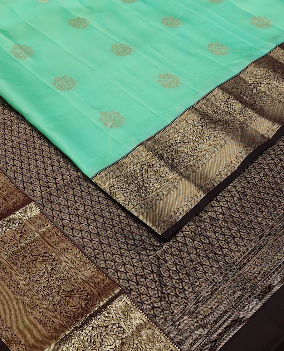 Turquoise floral buttas silk saree, contrast jaal pallu & border of rekku,manga,lavangam,kathir & zari stripes