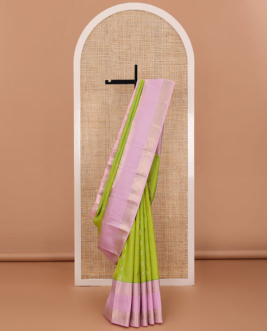 Parrot green meena buttas silk saree, contrast pink rettai pettu border of thilakam mokku,banaras,muthu,kathir & kodi visiry