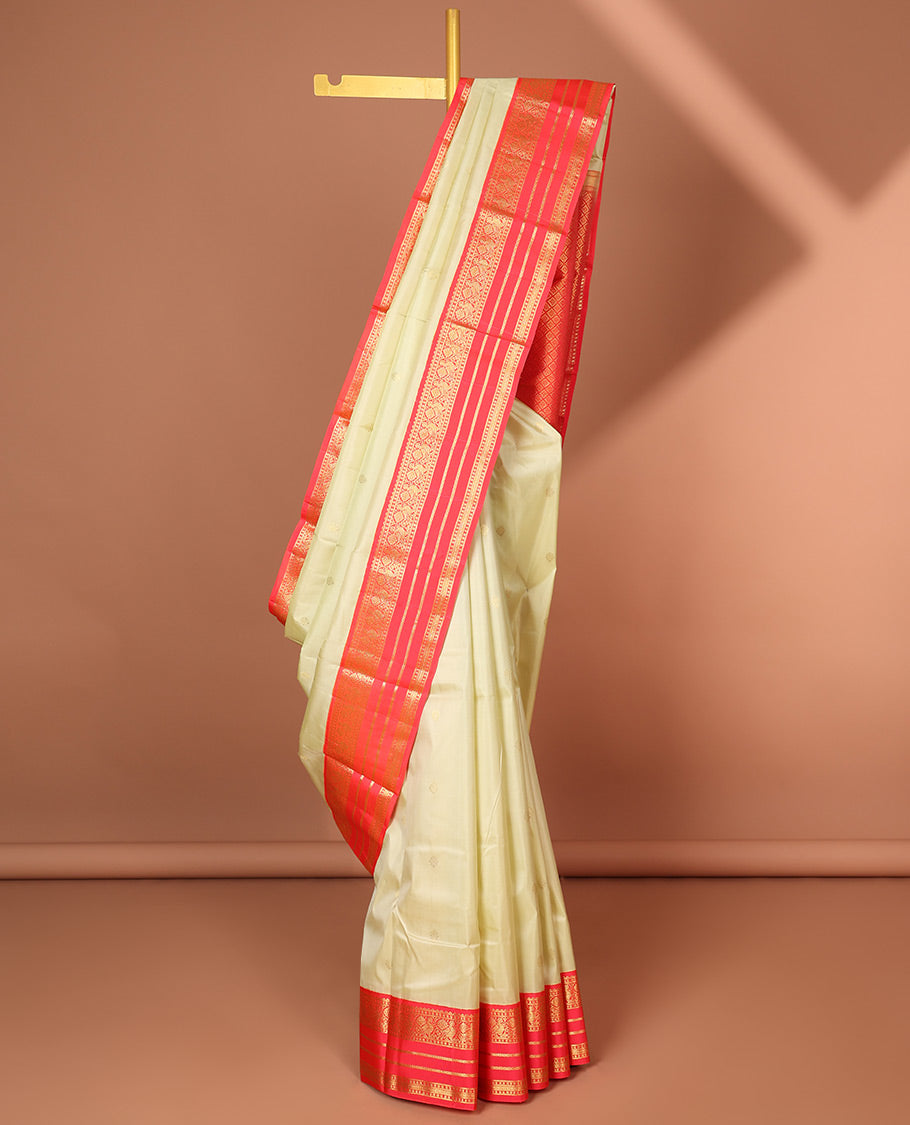 Cream floral buttas silk saree with korvai border of rekku , mayil design & intricate jaal zari design pallu
