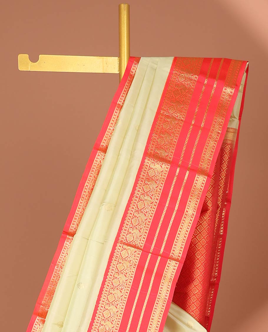 Cream floral buttas silk saree with korvai border of rekku , mayil design & intricate jaal zari design pallu