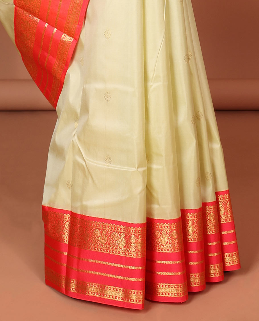 Cream floral buttas silk saree with korvai border of rekku , mayil design & intricate jaal zari design pallu