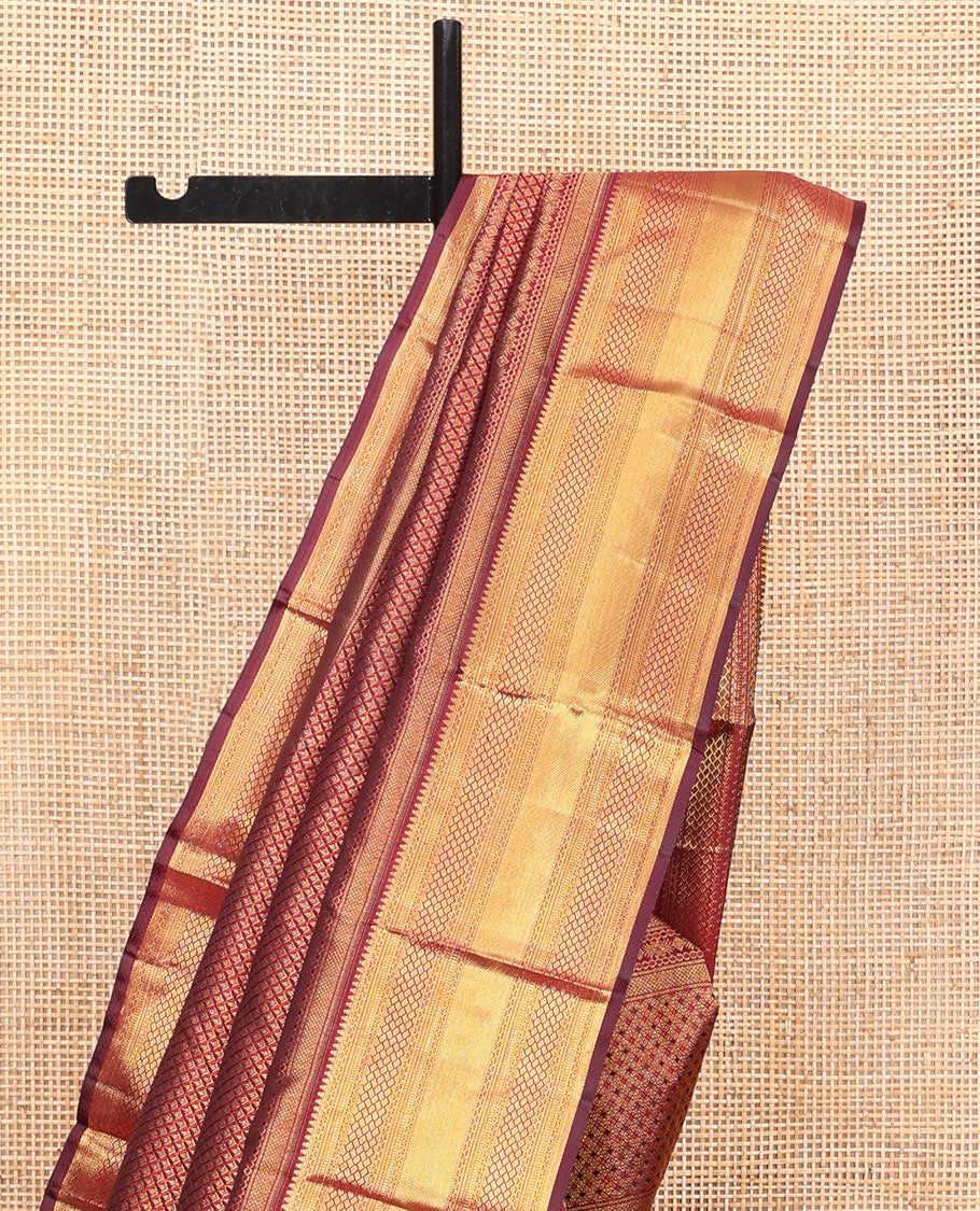 Maroon Kanchipuram Wedding Silk Saree, Gracefully Embellished with Floral Creeper Jacquard Design on Its Body, Highlighted by Zari Border of Rekku, Muthu, Neli, Zari Strips, and Jaal Designs, Grand Pallu, and Paired with a Matching Blouse