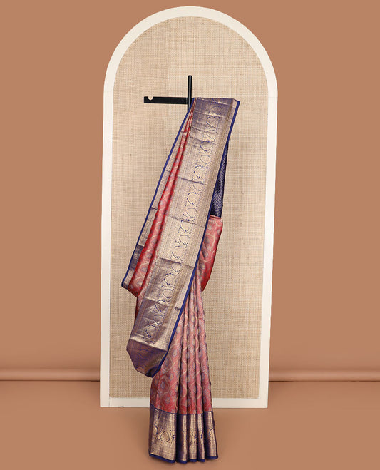 Red jacquard Kanchipuram wedding silk saree, contrast border of banaras, thilakam, neli, mayil, chakram, kuthirai, and floral designs, and pallu of greek key designs