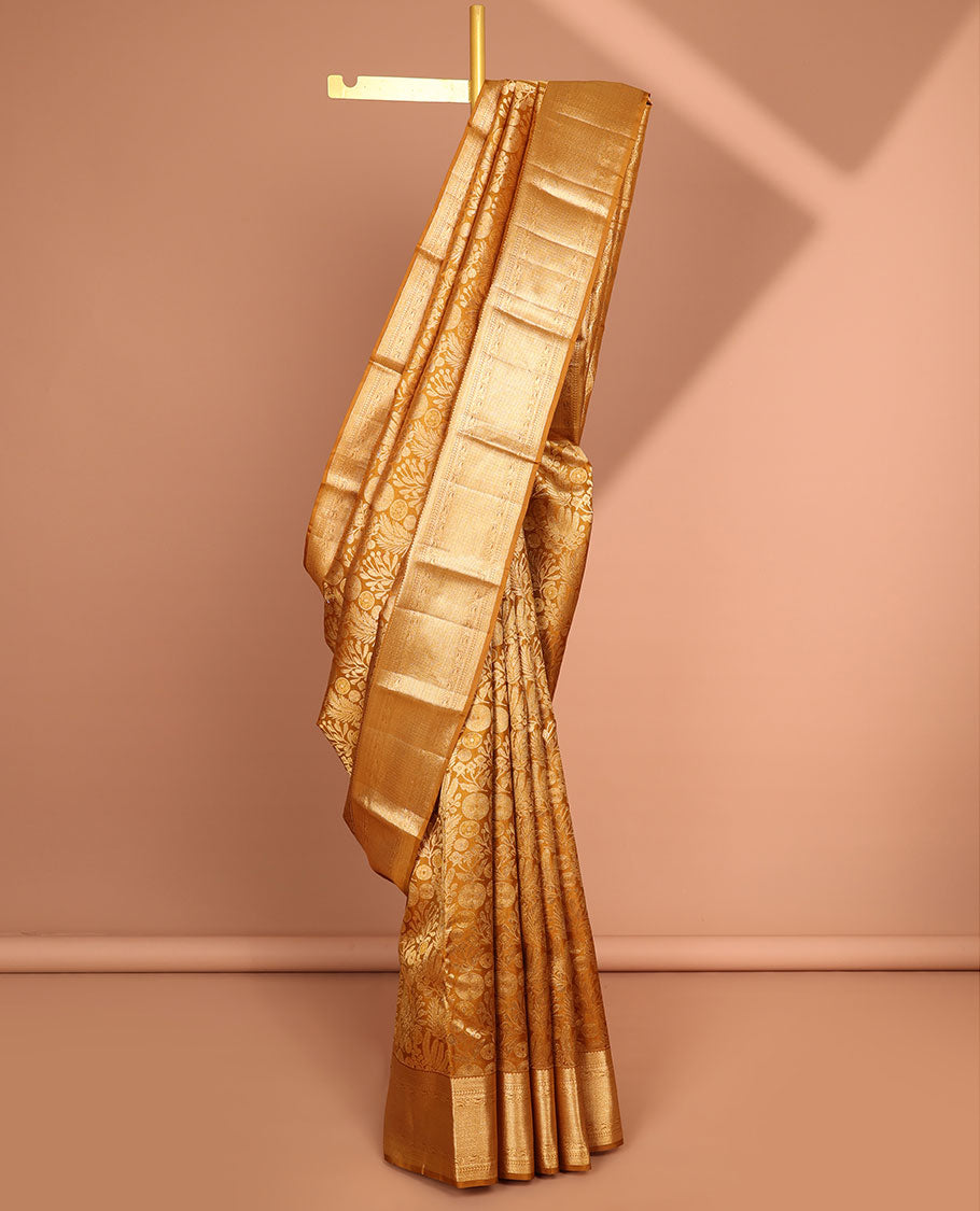 Brown floral jacquard kancheepuram silk saree with contrast border of rekku, kuyil kann design & zari design pallu