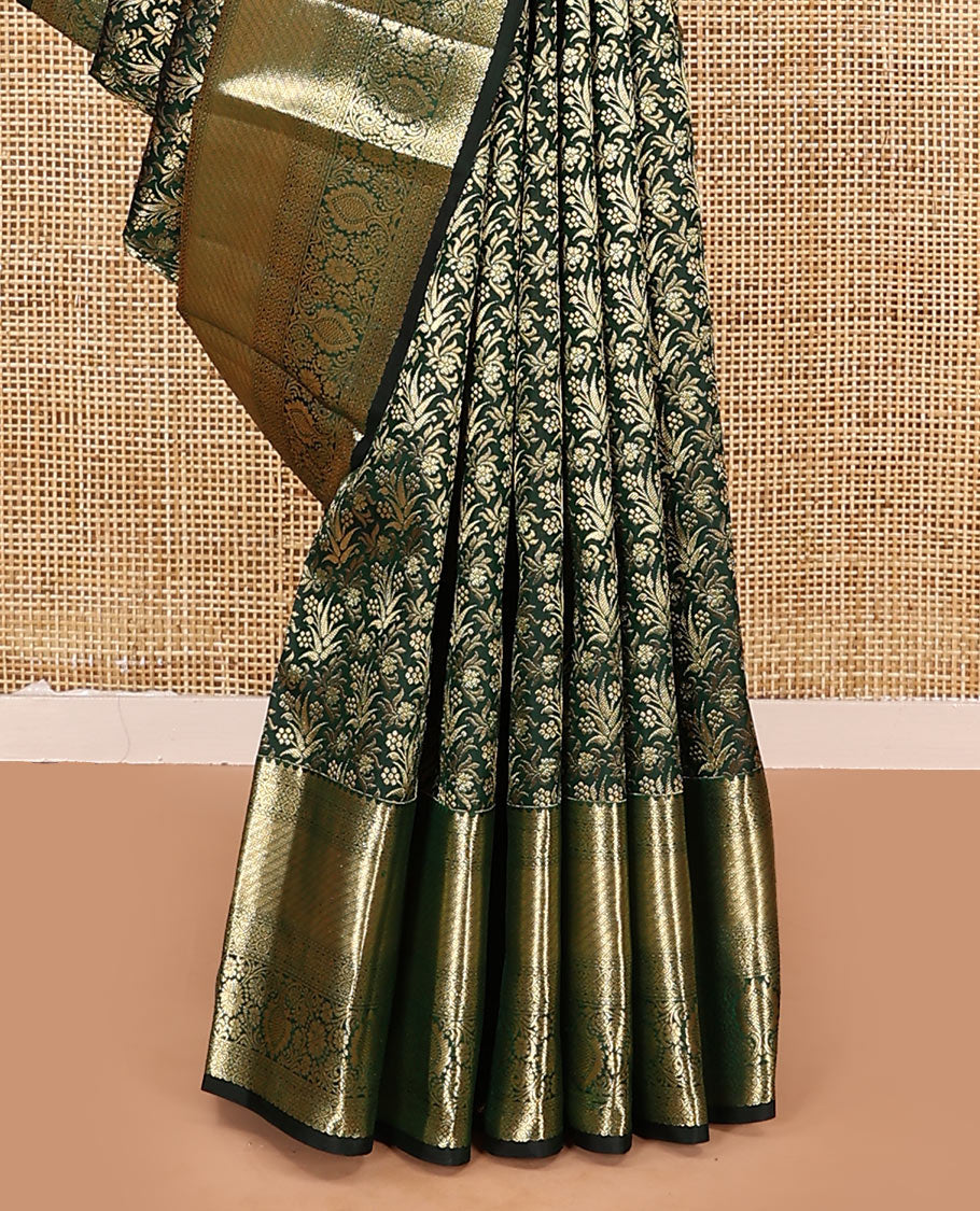 Green jacquard kanchipuram silk saree, zari border of thilakam, greek key, and kodi visiry designs, and intricate pallu