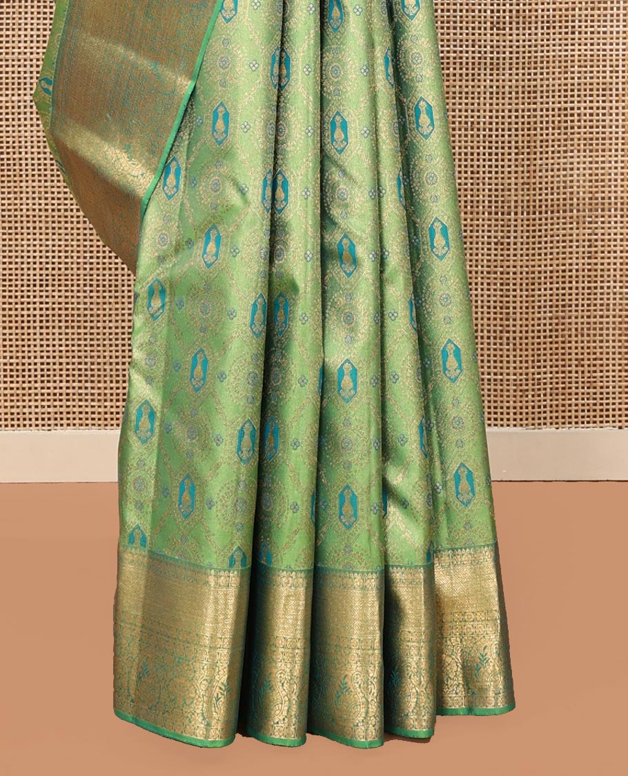 Green Kanchipuram Wedding Silk Saree, Elegantly Highlighted with Meenakari Jacquard on Its Body, Highlighted by a Zari Border of Jaal, and Arumbu Manga Designs, Grand Jaal Pallu, and Paired with a Matching Blouse