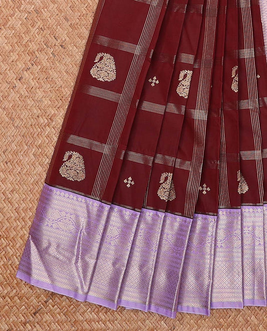 Maroon butta enclosed checked gift saree, contrast traditional zari border, and jaal pallu