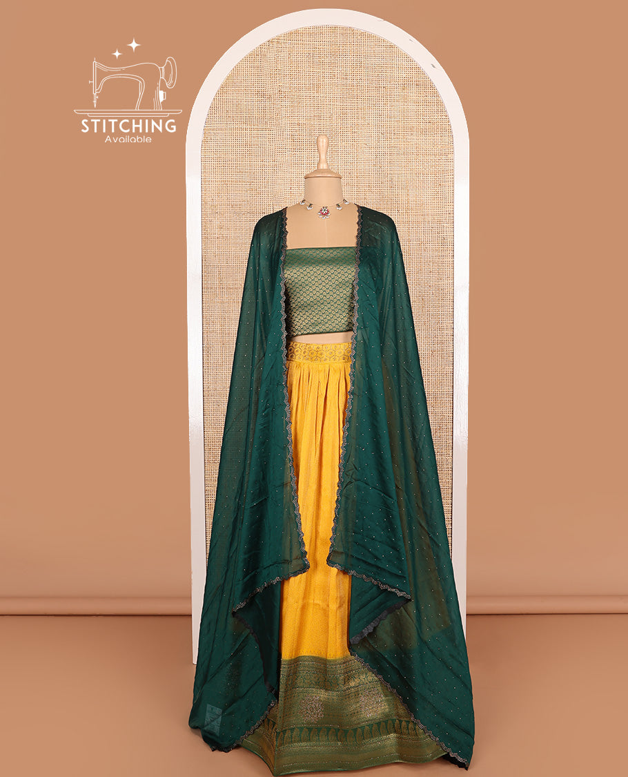 Mango yellow art silk half-saree, brocade with contrast traditional border skirt, contrast brocade blouse, scallop stone work dhavani, and detachable belt