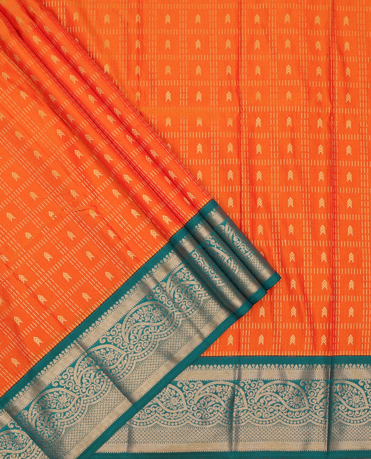Orange art silk pavadai set, zari design with contrast traditional zari bordered skirt and a contrast zari border blouse
