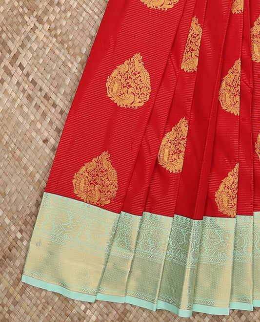Red peacock buttas and striped budget silk saree, contrast traditional zari border, and intricately woven pallu
